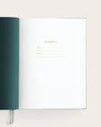 Handbound journal first page with letterpress text