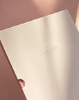 Slipcase with embossed logo