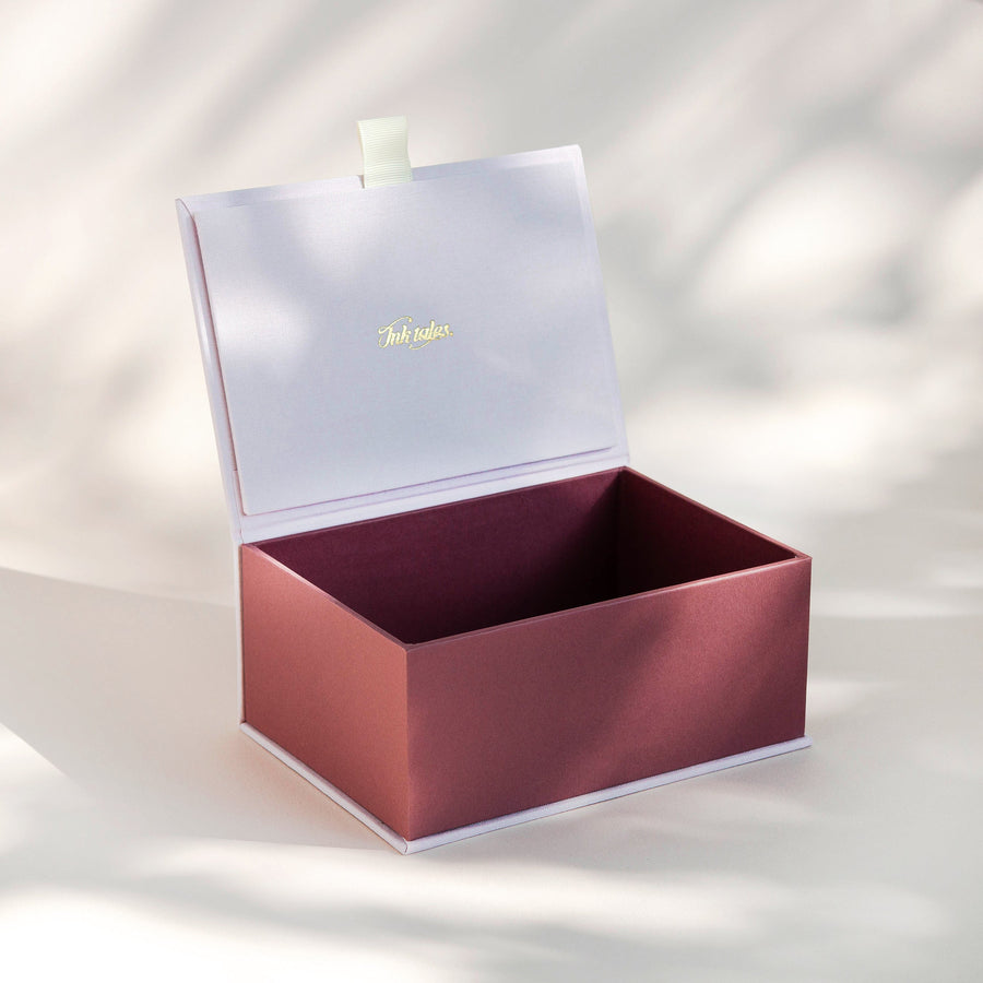 Open handcrafted keepsake box in Blush and Deep Rose colour with foil stamped logo