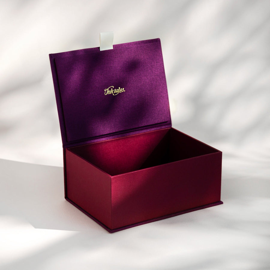 Open handcrafted keepsake box in Huckleberry and Noble Red colour with foil stamped logo