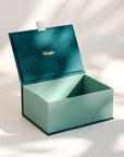 Open handcrafted keepsake box in Jade and Matcha colour with foil stamped logo