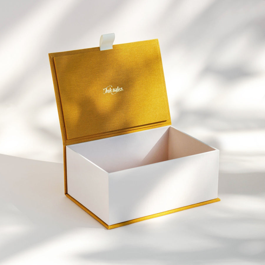 Open handcrafted keepsake box in Mustard and Biscuit colour with foil stamped logo