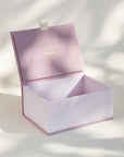 Open handcrafted keepsake box in Old Rose and Pastel Rose colour with foil stamped logo