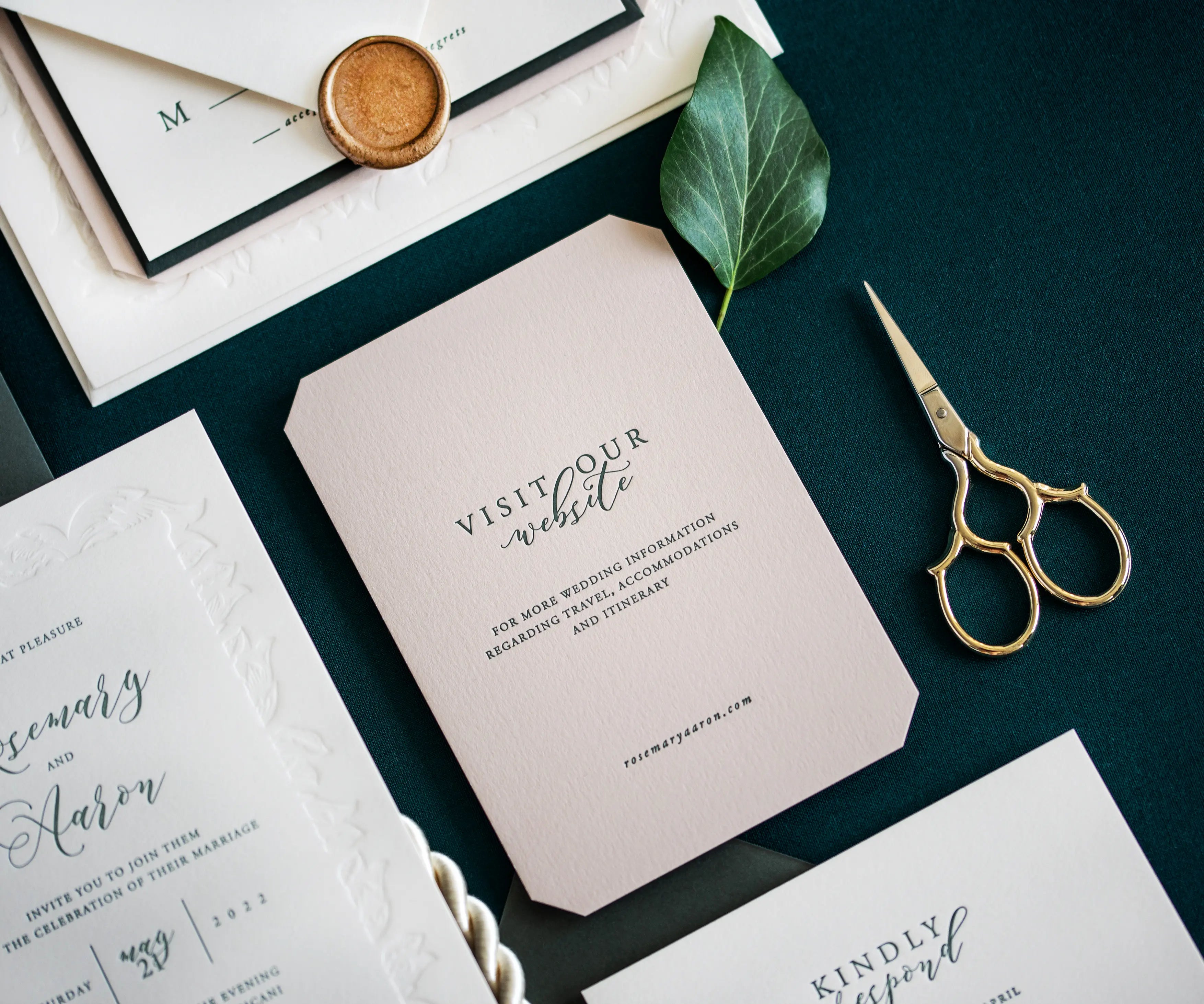 Letterpress detail card and a golden pair of scissors