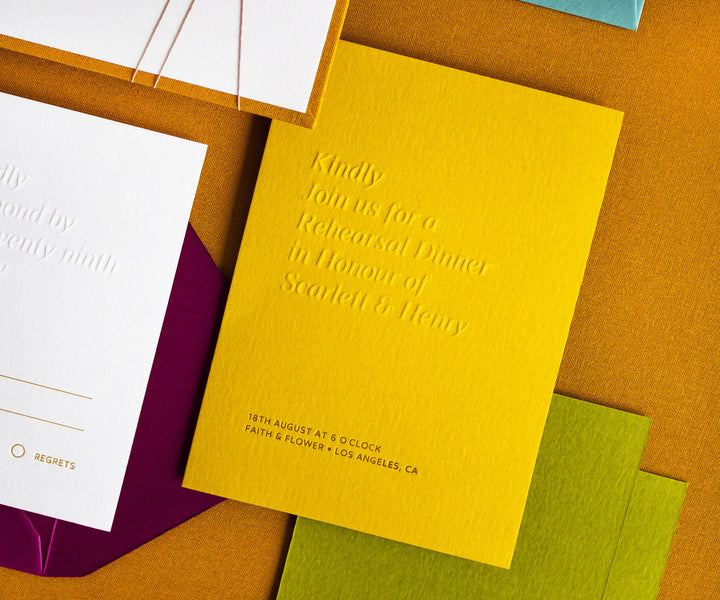 Letterpress detail card with embossed text on yellow paper