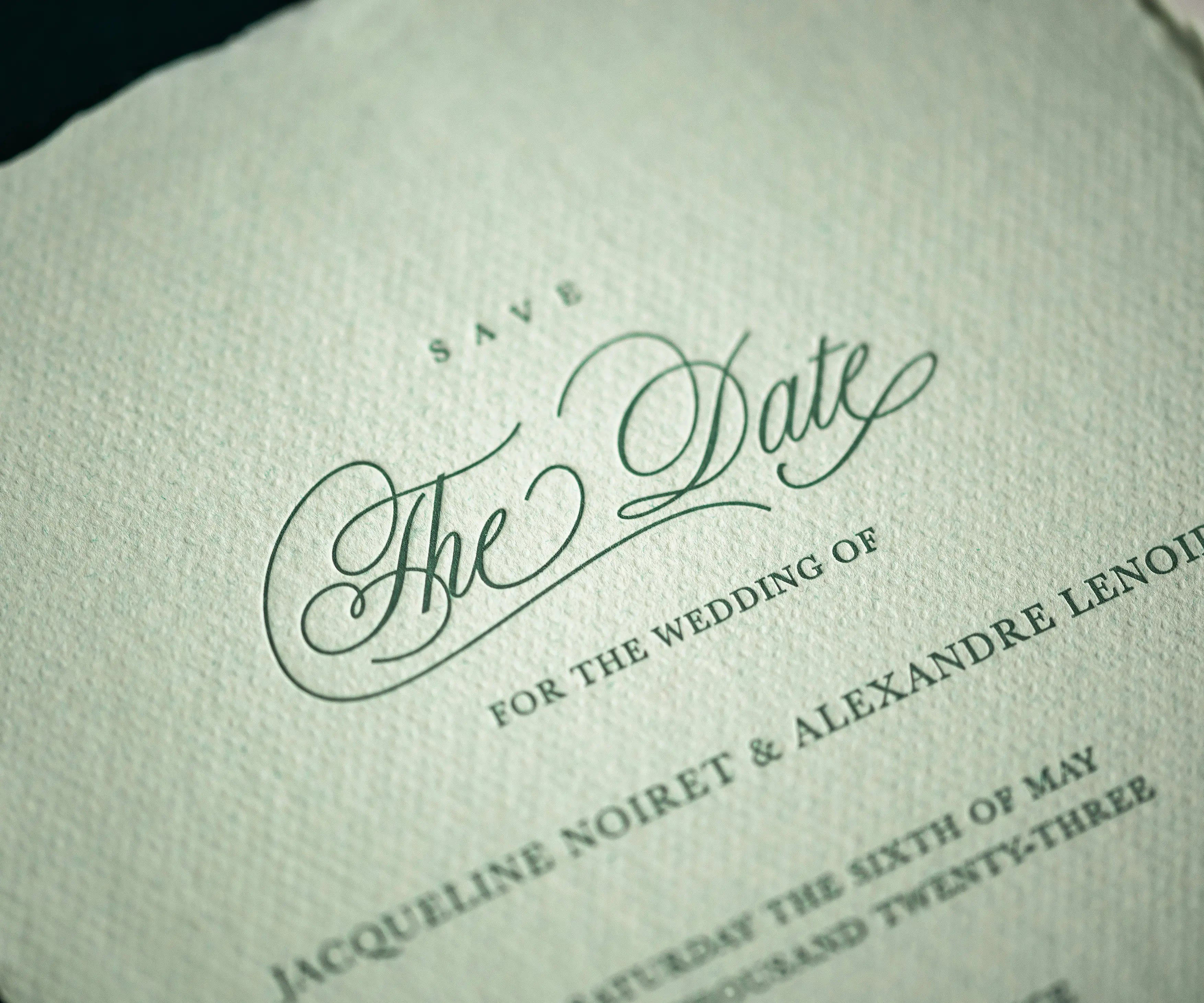 Letterpress Sava the Date text on handmade paper