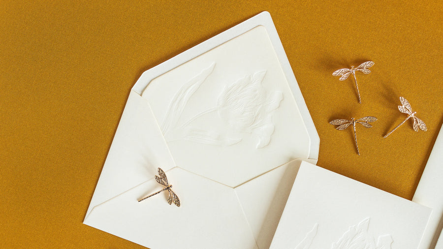 Envelope with blind letterpress tulip liner