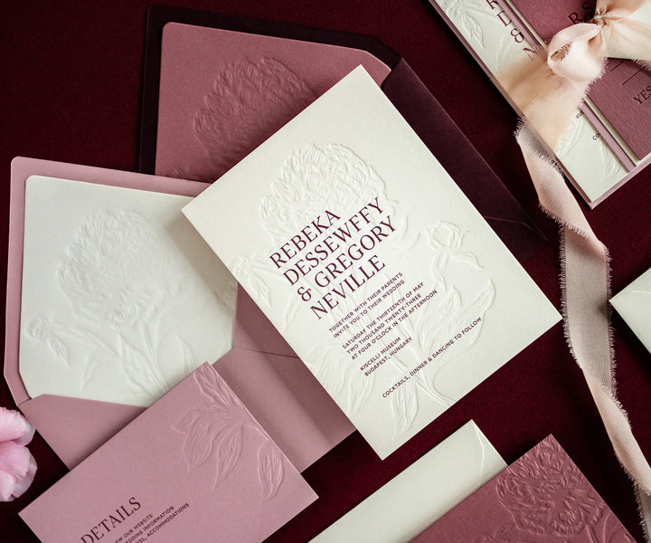 Letterpress wedding invitation with blind and bordeaux colour printing and envelope