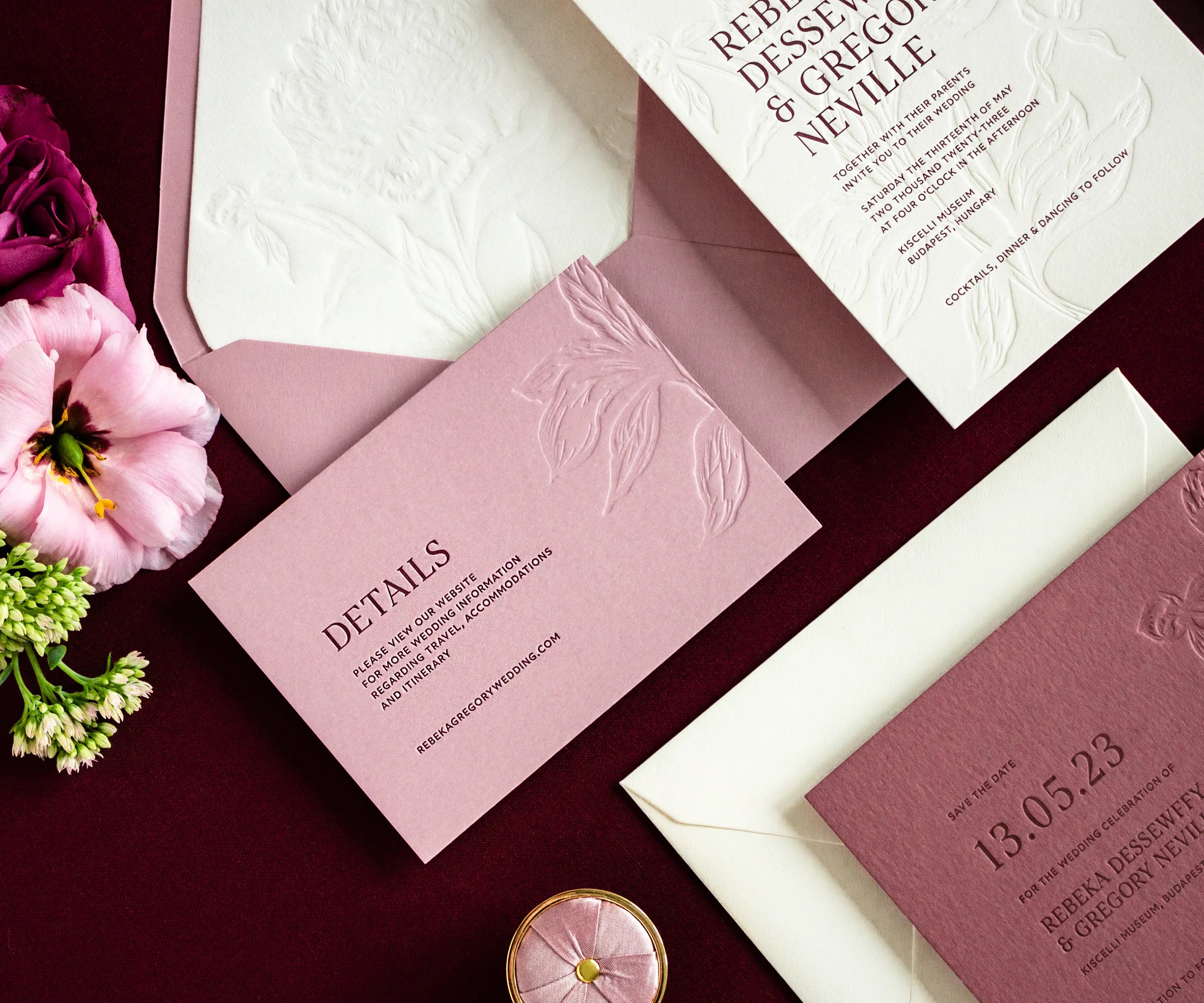 Letterpress detail card on envelope next to peony flowers